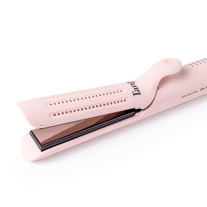 A pink heat-styling tool