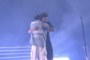 J. Cole and Drake hugging at Dreamville festival 2023.