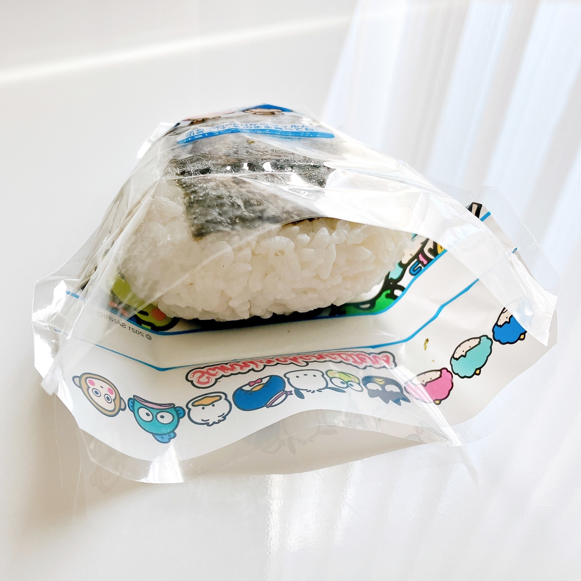 DAISO（ダイソー）のおすすめお弁当グッズ「おにぎりデコパック三角 サンリオキャラクターズ4枚入」