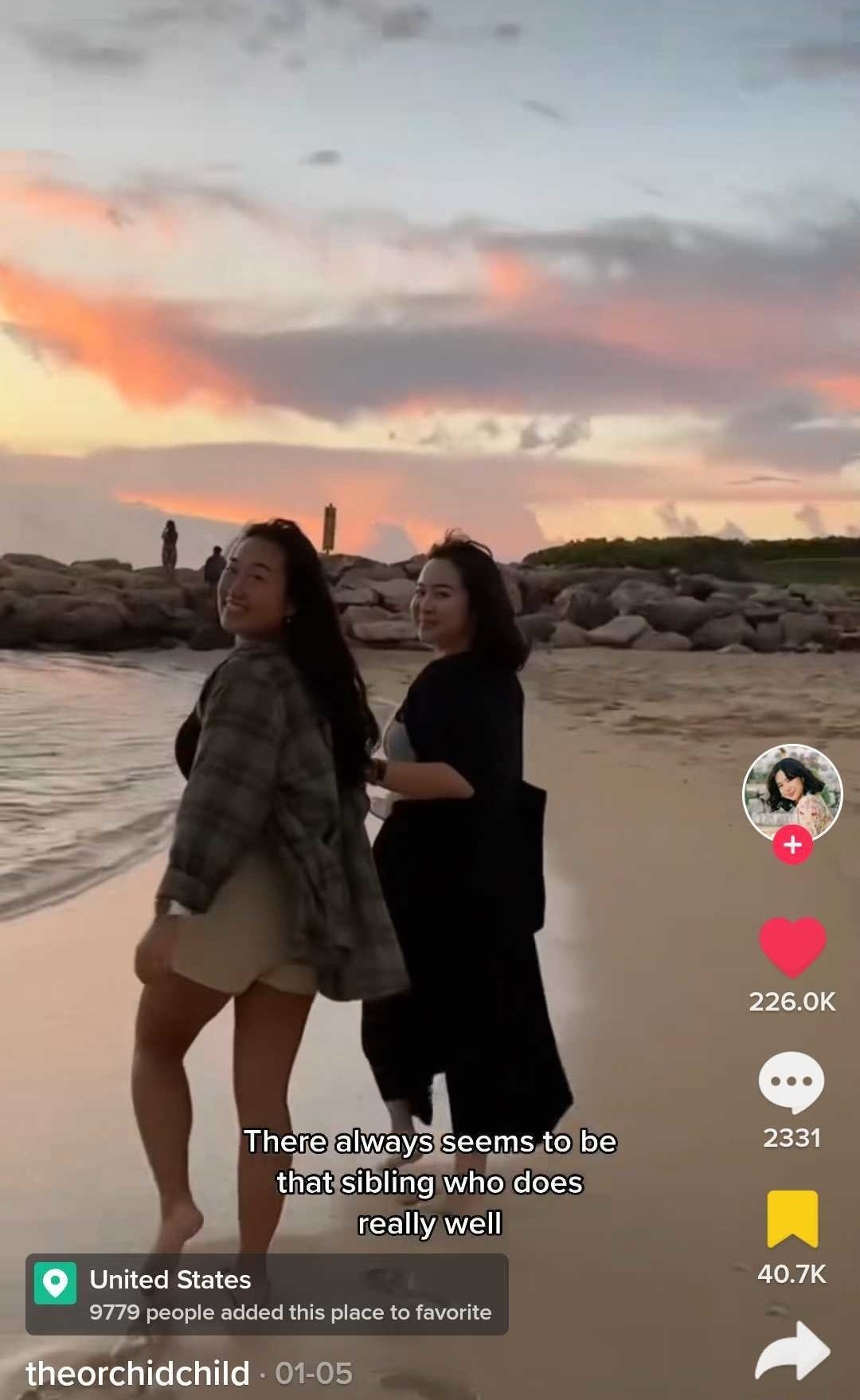 Judy and her sister walking on the beach