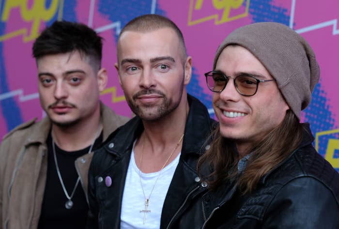 A close up of Andrew Lawrence, Joey Lawrence, and Matthew Lawrence