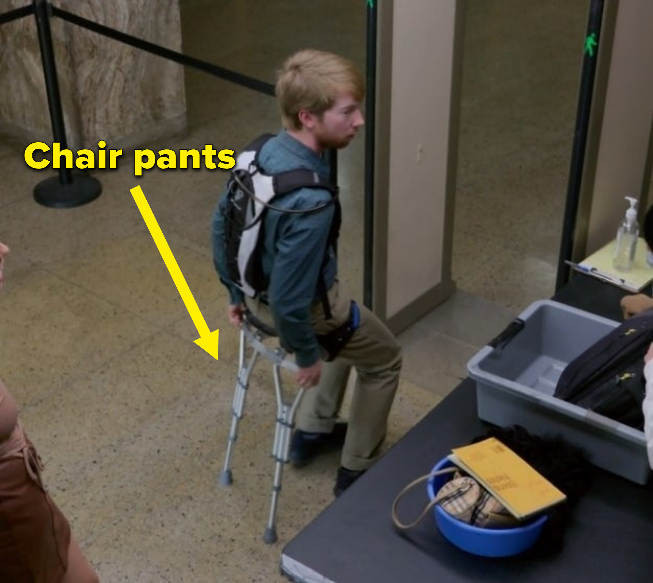 Todd wears chair pants as he enters the courtroom