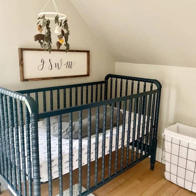 a user submitted photo of the crib in navy