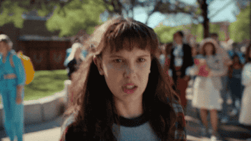 eleven from stranger things trying to use her powers