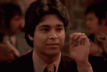 fez from that 70s show licking his teeth
