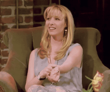 phoebe from friends covering mouth in surprise