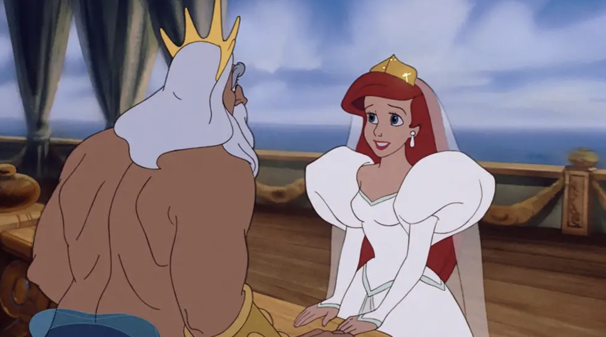 A still from The Little Mermaid showing Ariel standing on the edge of a boat in a white dress and veil, her father King Triton is standing in front of her