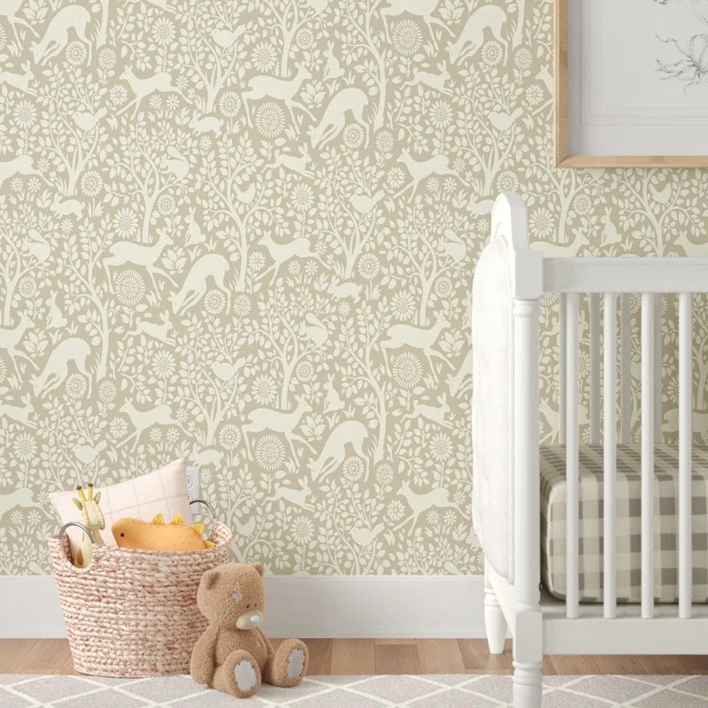 the neutral woodland themed wallpaper in a room