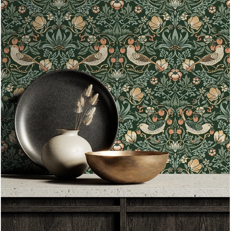 the wallpaper featuring birds and flowers in brown and green and muted orange and yellow tones