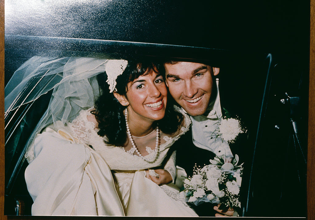 Carol and Charles Stuart on the day of their wedding, inside a limo