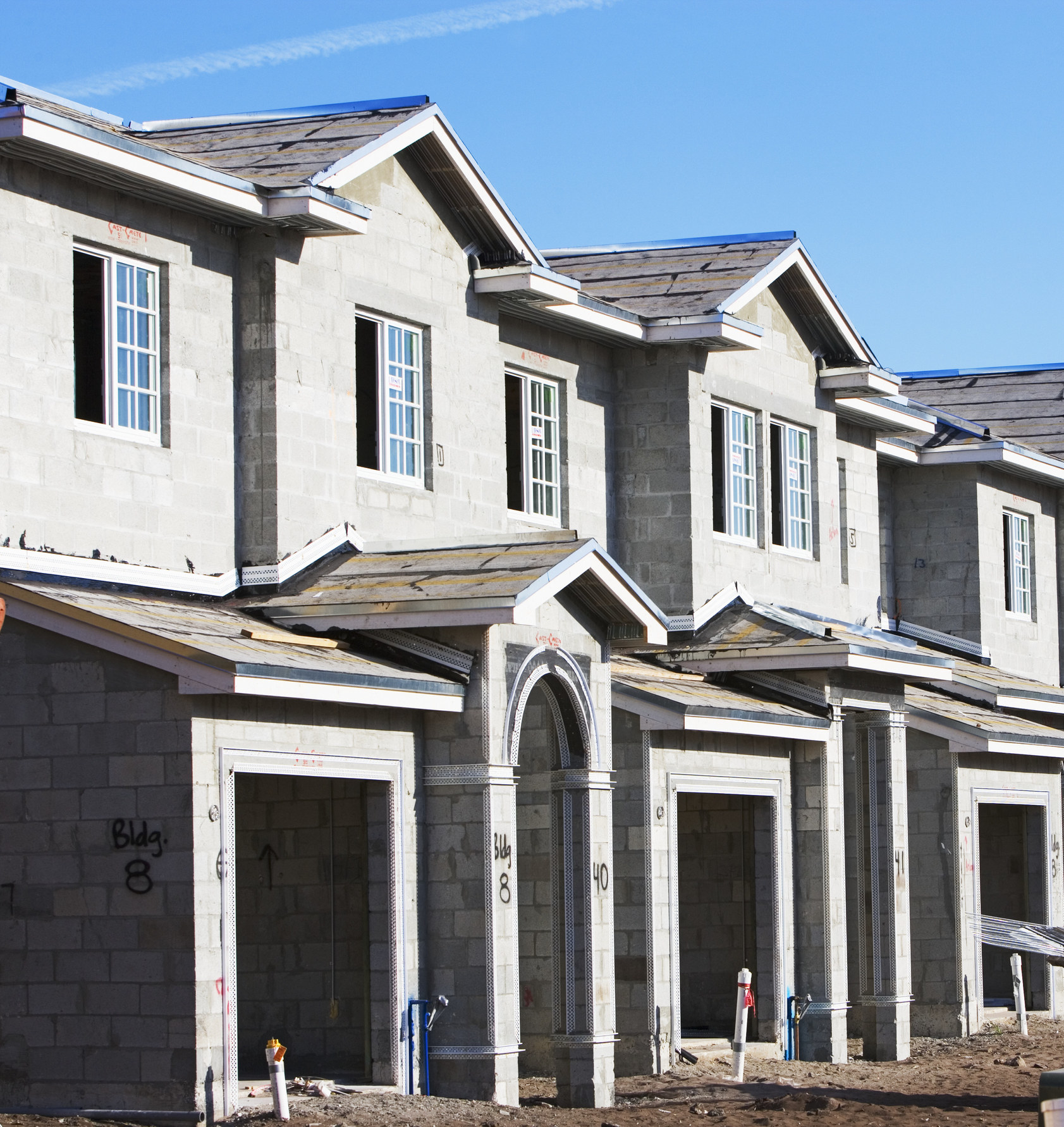 row of new homes being built