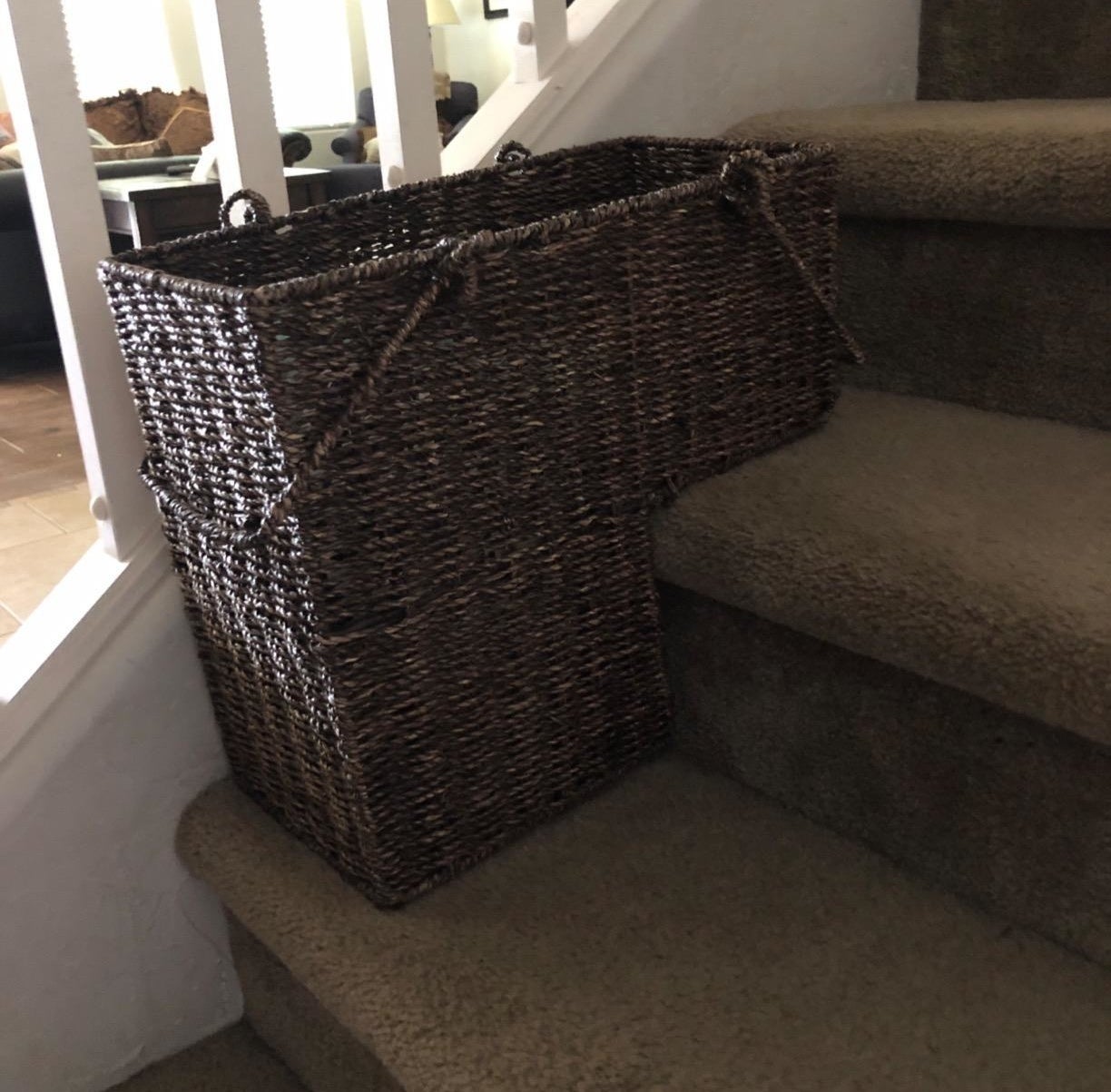 Reviewer image of the basket on their stairs