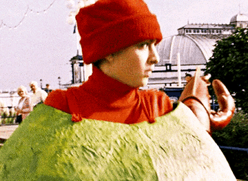 girl dressed in an olive costume