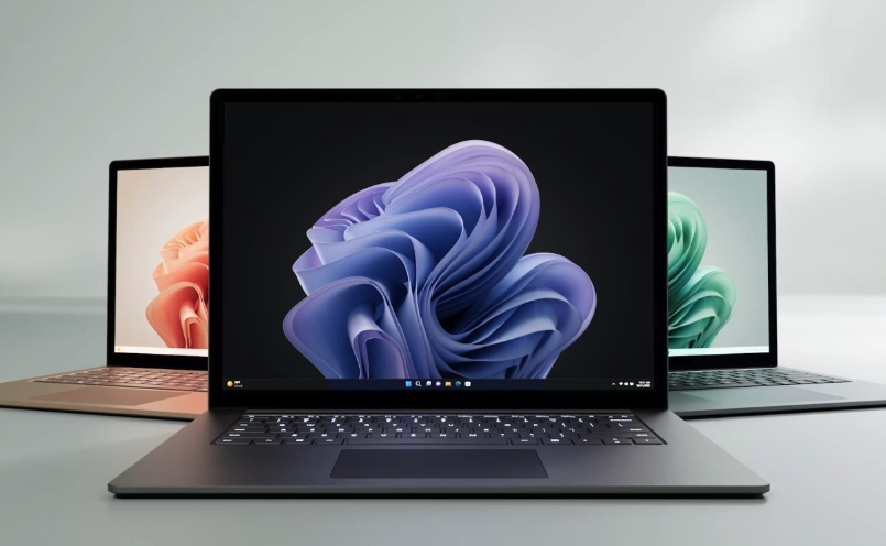 a trio of surface laptops