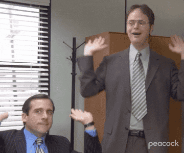 Michael and Dwight throwing their hands in the air in The Office