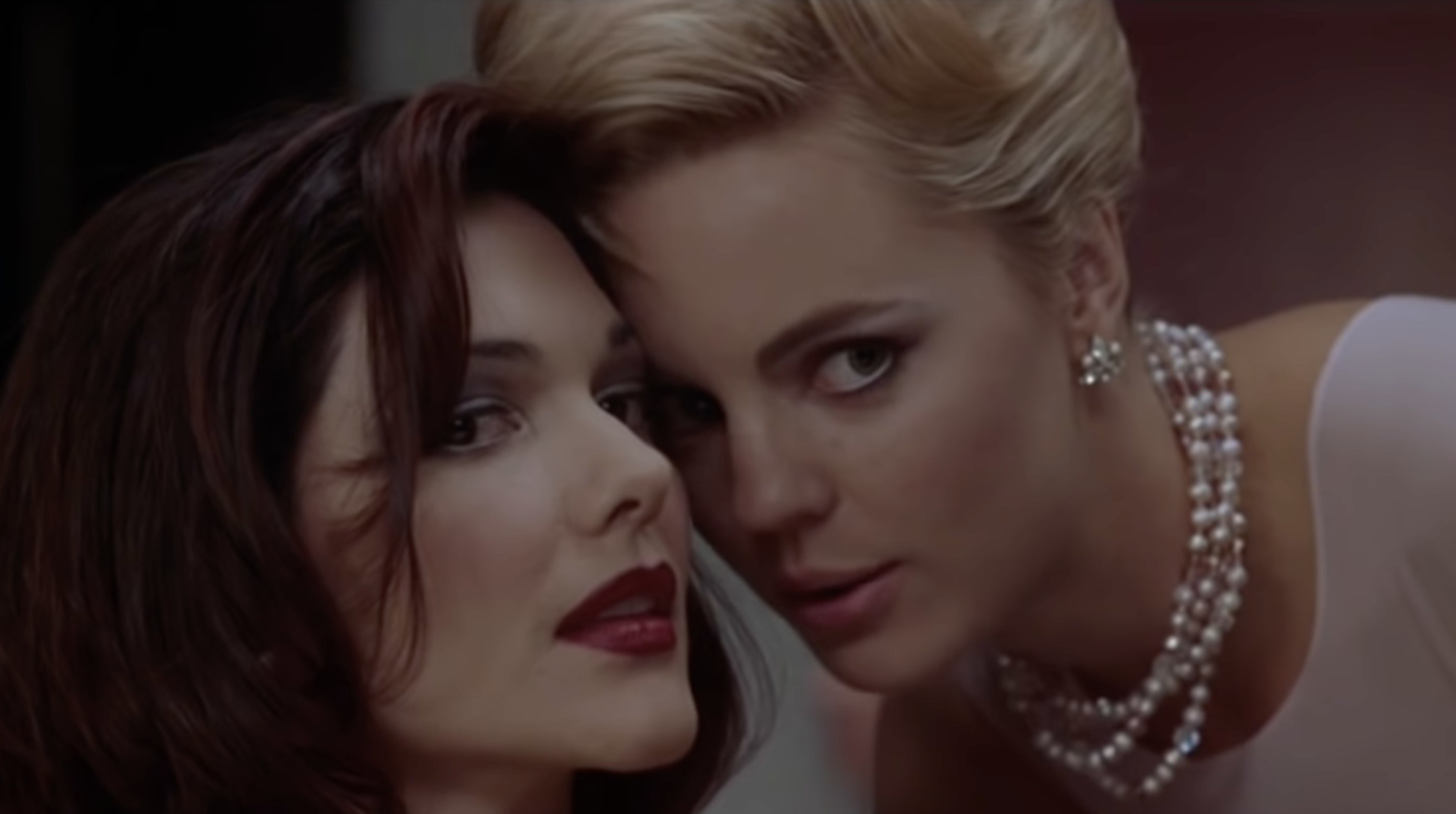 Naomi Watts and Lara Harring steal a kiss to stir up jealousy in Mulholland Drive