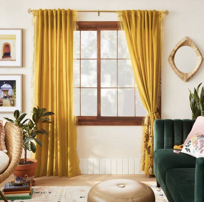A set of yellow velvet curtains