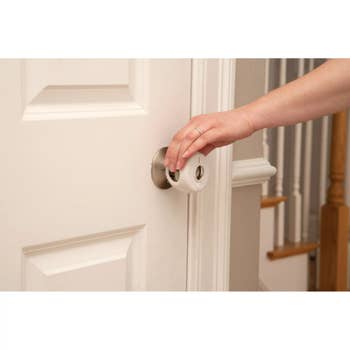 Door knob screen being used