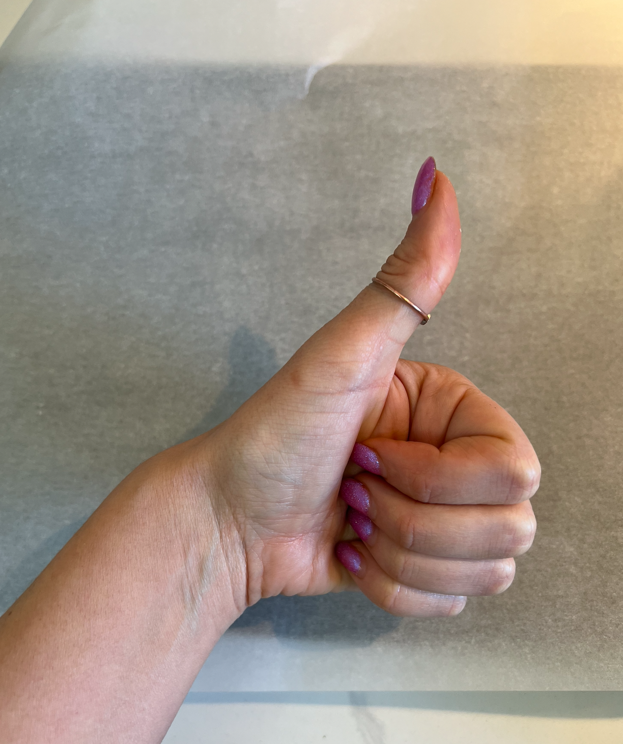 The writer giving a thumbs up