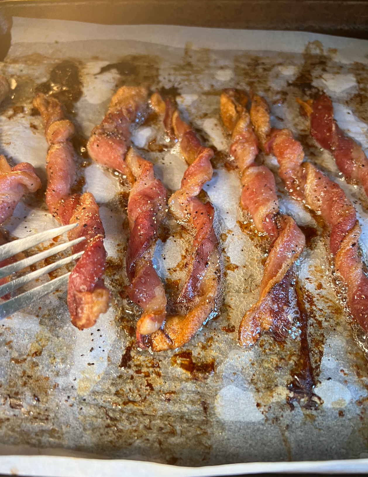 Twisted, seasoned bacon