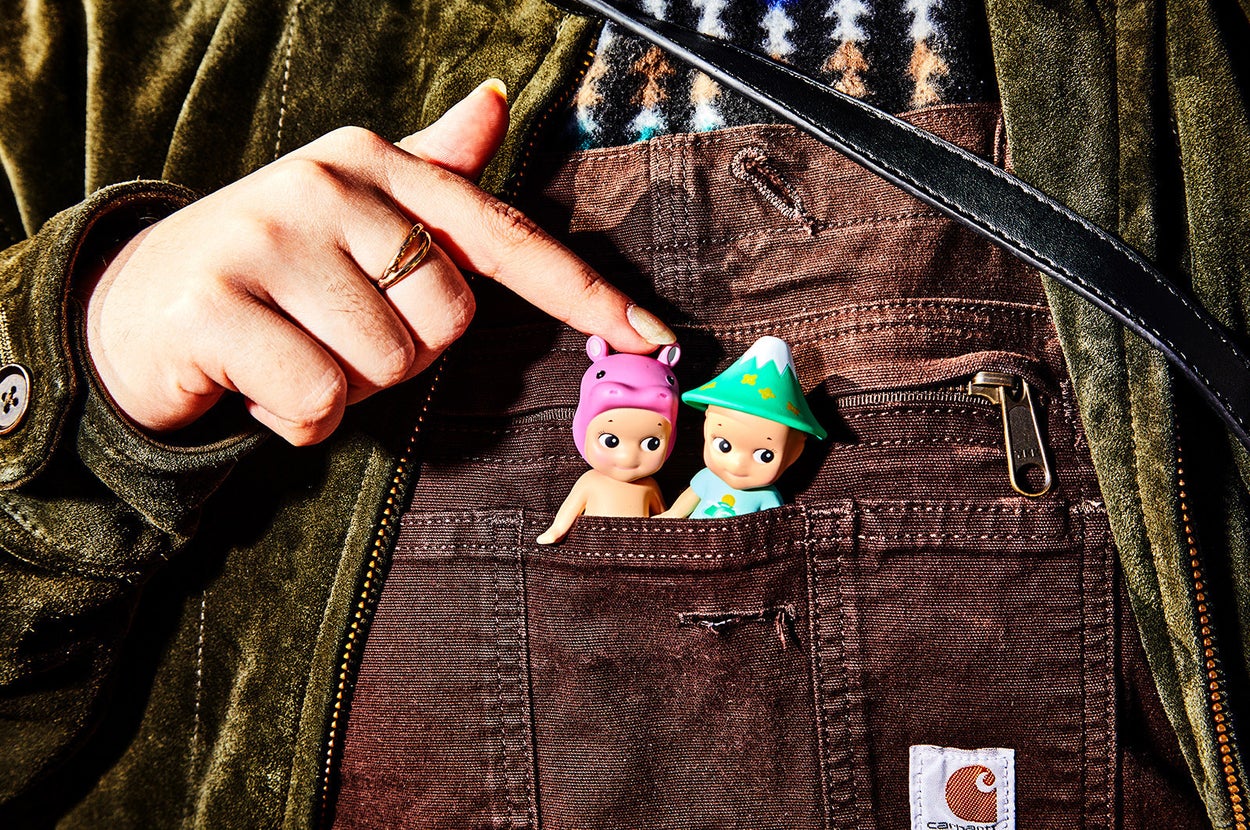 This Viral, Fruit-Headed Doll And Its Tiny Penis Is Everyone’s Emotional Support Crutch