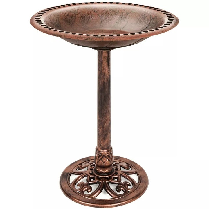 Image of copper bird bath