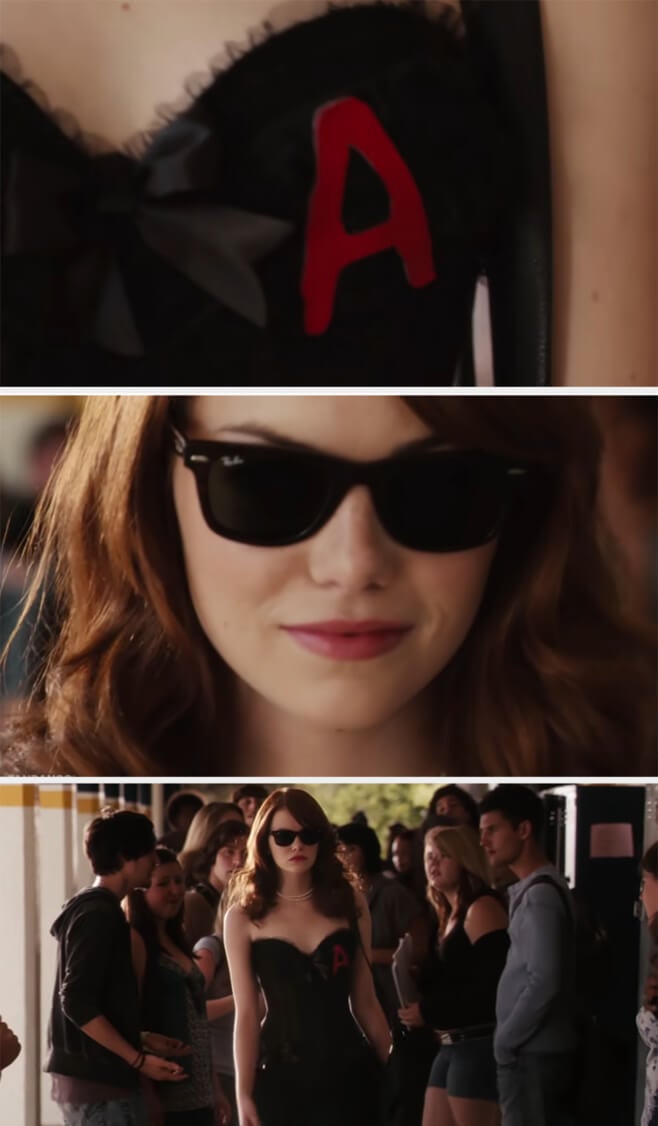 Olive walking around the school hallways and greeting people