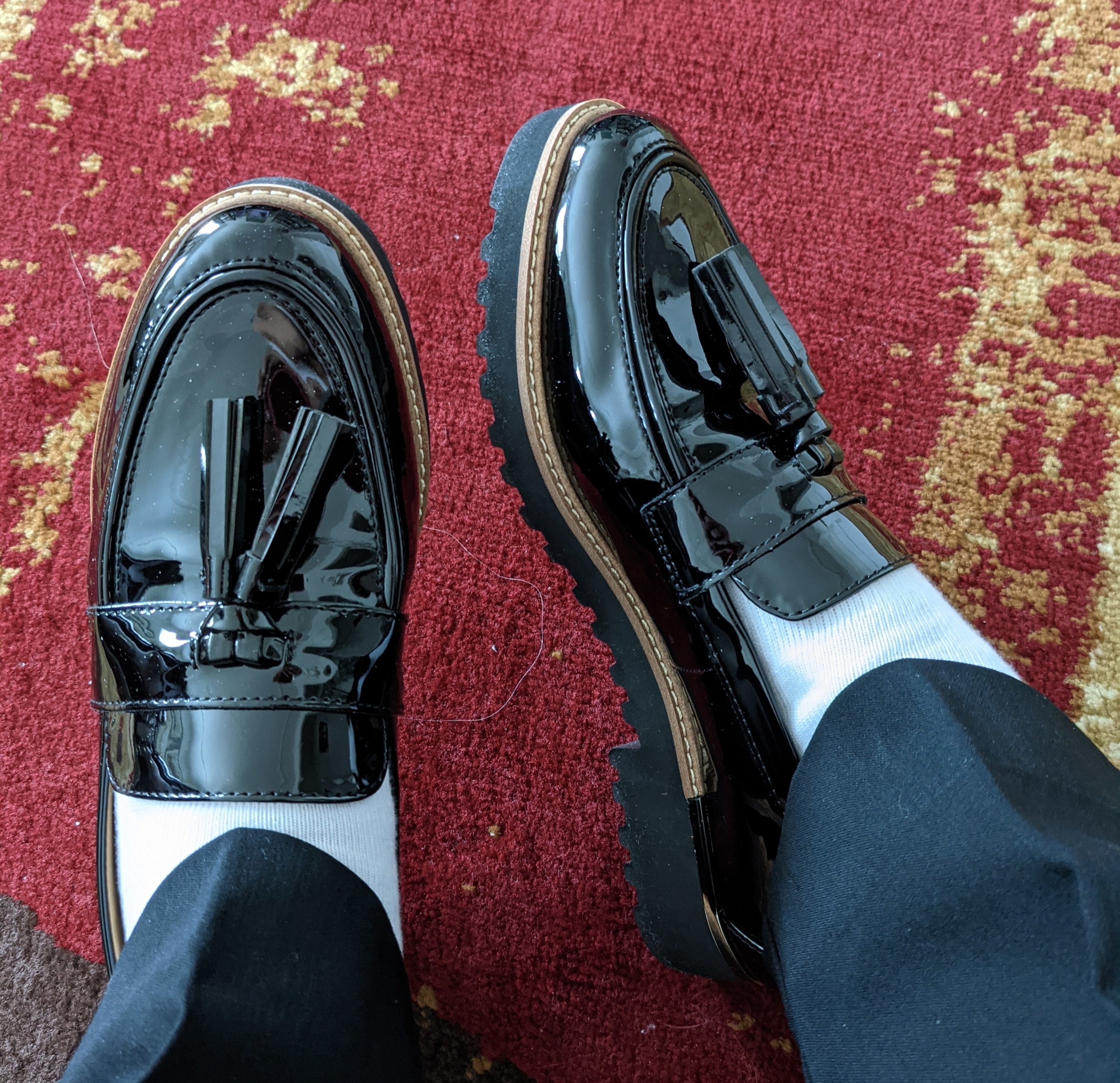 reviewer wearing the platform loafers