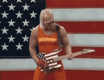 Hulk Hogan playing the guitar