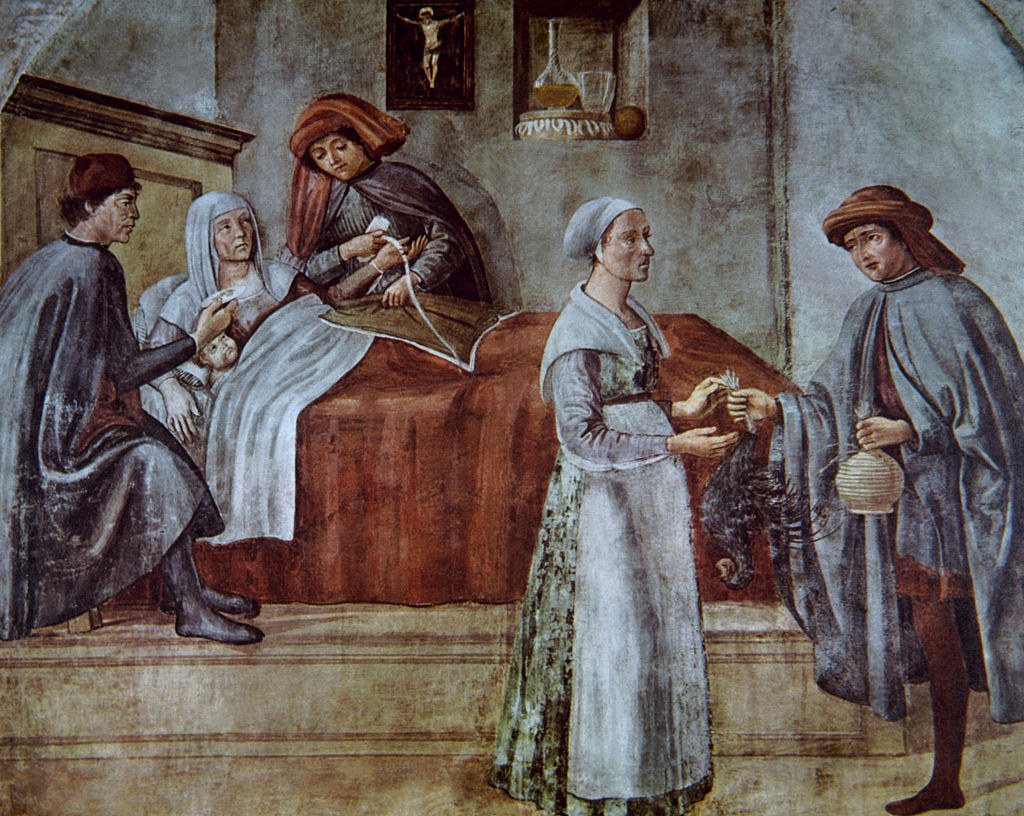 Rendition of a woman giving birth in front of others