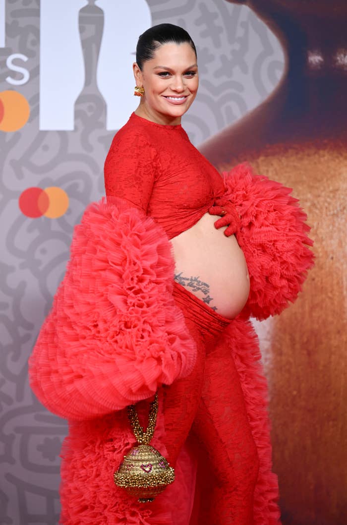 Jessie showing off her baby bump at the at an awards show