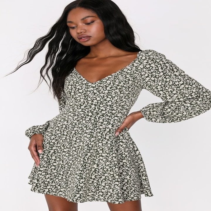 Image of model earing the floral dress