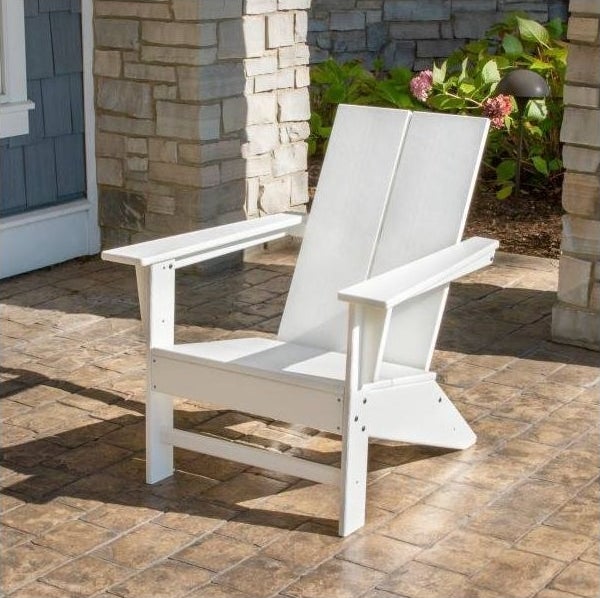 the chair in white outside of a house