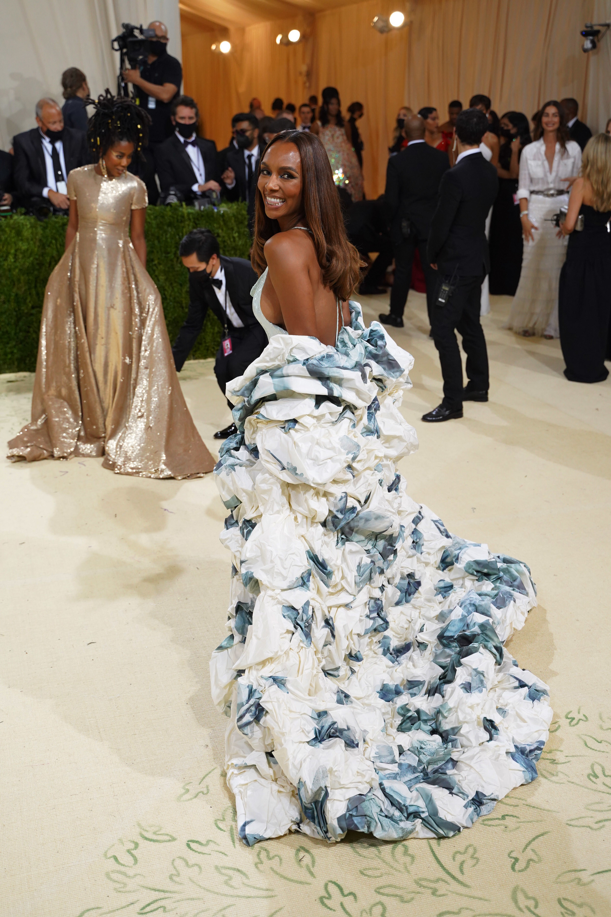 Janet Mock grins in a ballgown at a Met event