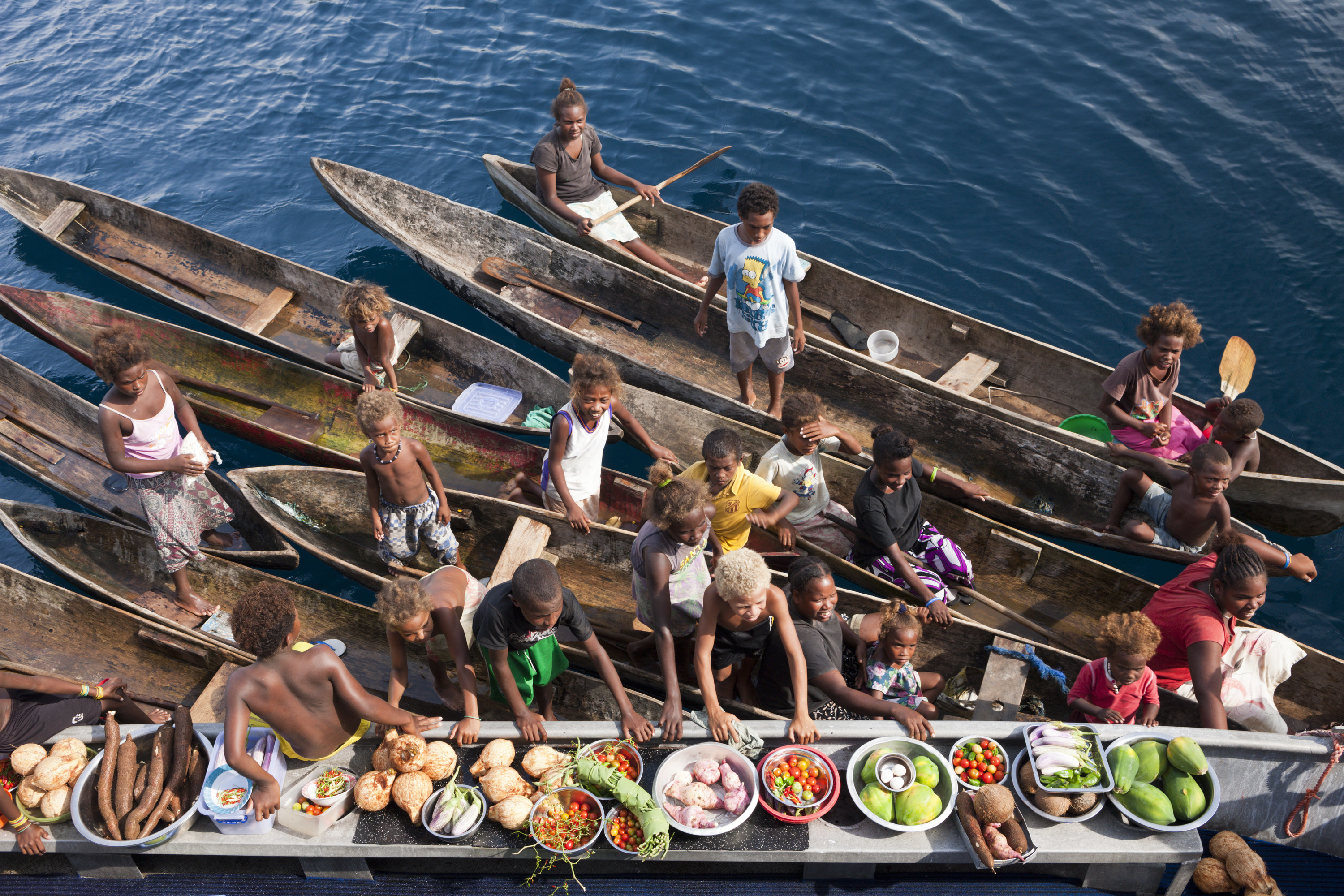 People on boats in the Solomon Islands