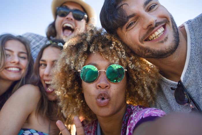 A group of young people laughing