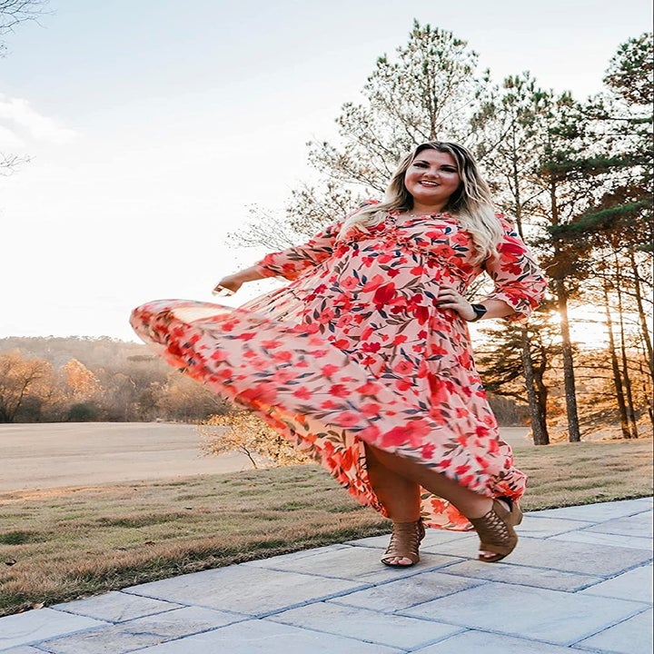 Reviewer wearing the floral print dress