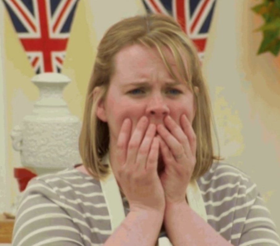 A &quot;Great British Baking Show&quot; contestant covers her face during a stressful moment