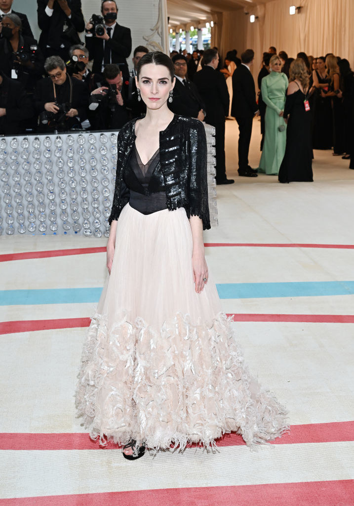 Bee Carrozzini at the 2023 Met Gala in a two tone black and white gown and jacket