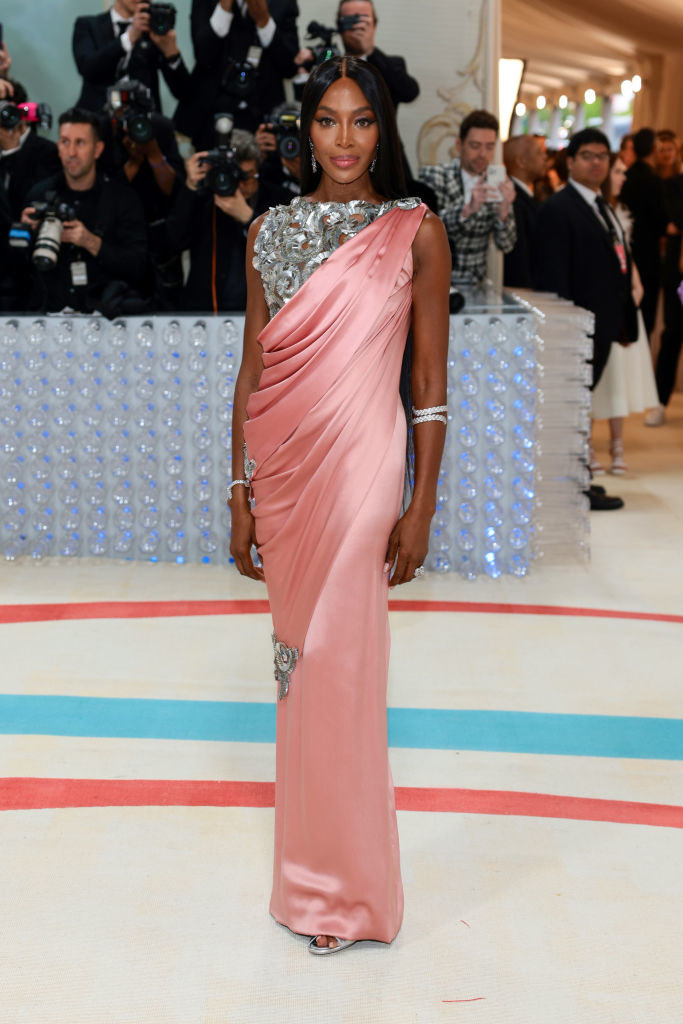 Naomi Campbell attends The 2023 Met Gala in a silk pink gown