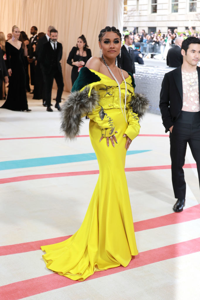 Ariana DeBose attends The 2023 Met Gala in a yellow gown