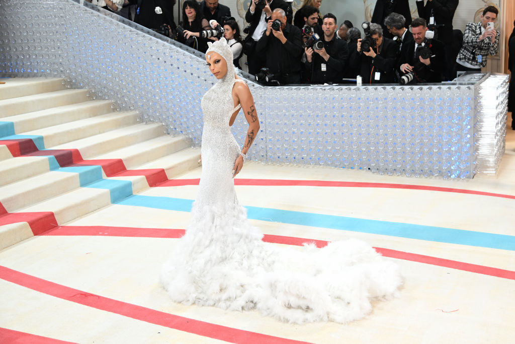 Doja Cat attends The 2023 Met Gala in a white gown