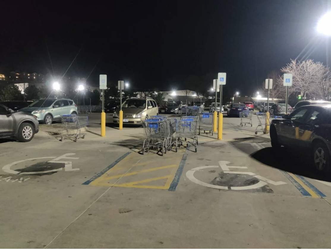cart abandoned in the walmart parking lot