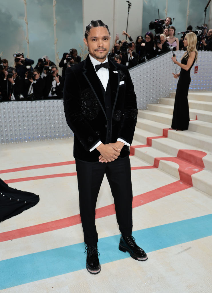 Trevor Noah attends The 2023 Met Gala in a classic suit