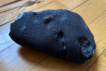 possible meteorite pictured inside family home