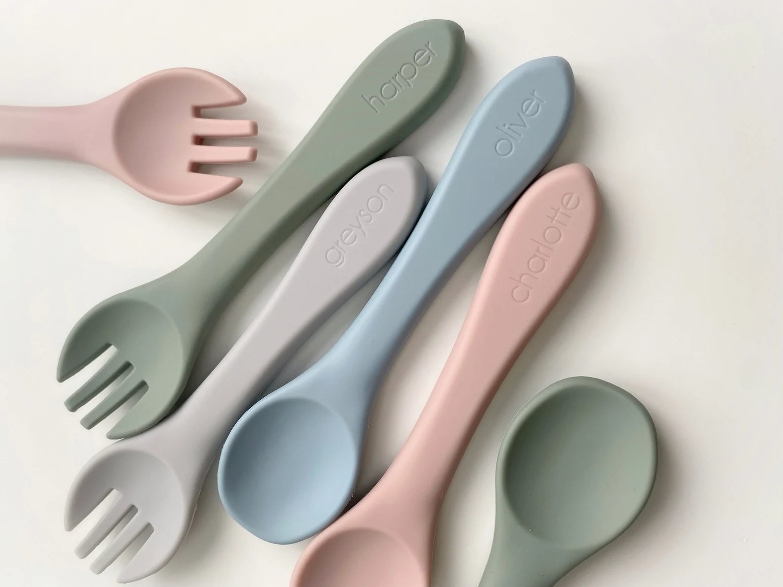 Multi-colored silicone forks and spoons for babies and toddlers with names engraved
