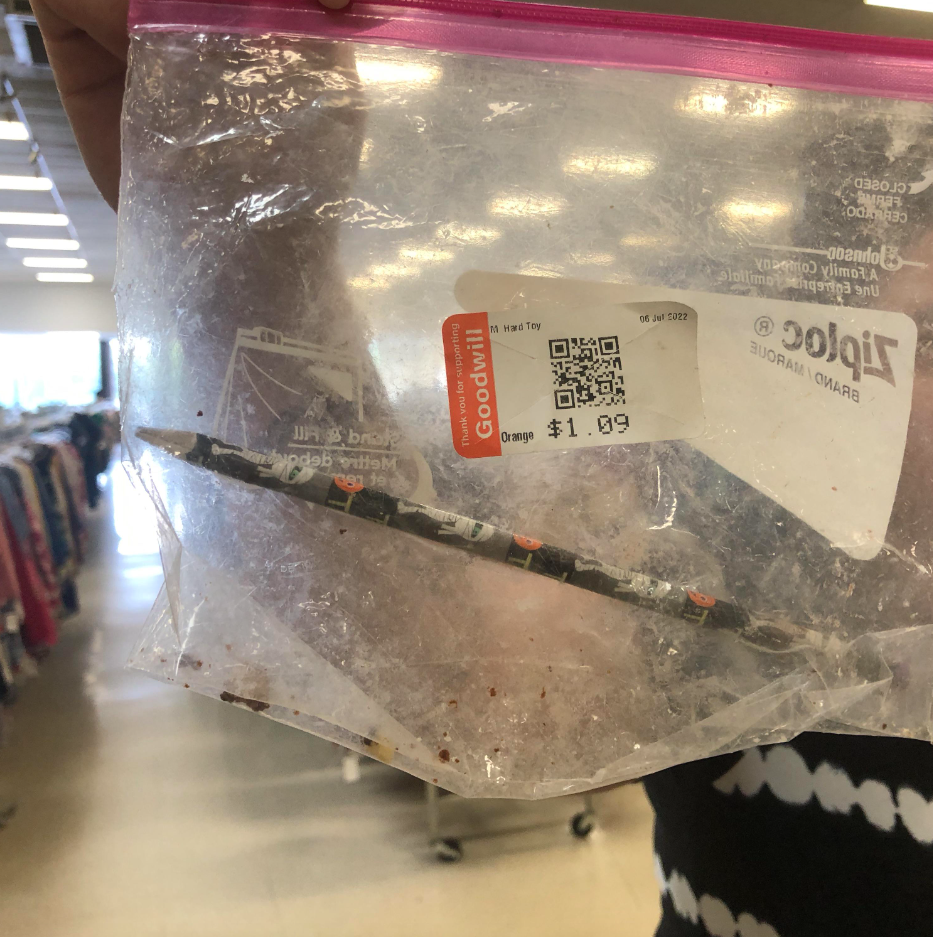 A dirty bag with a used pencil