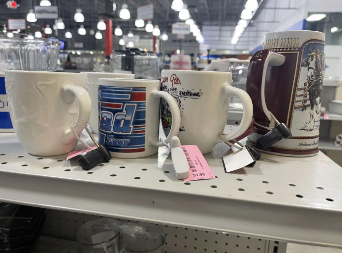 Mugs for sale on a shelf
