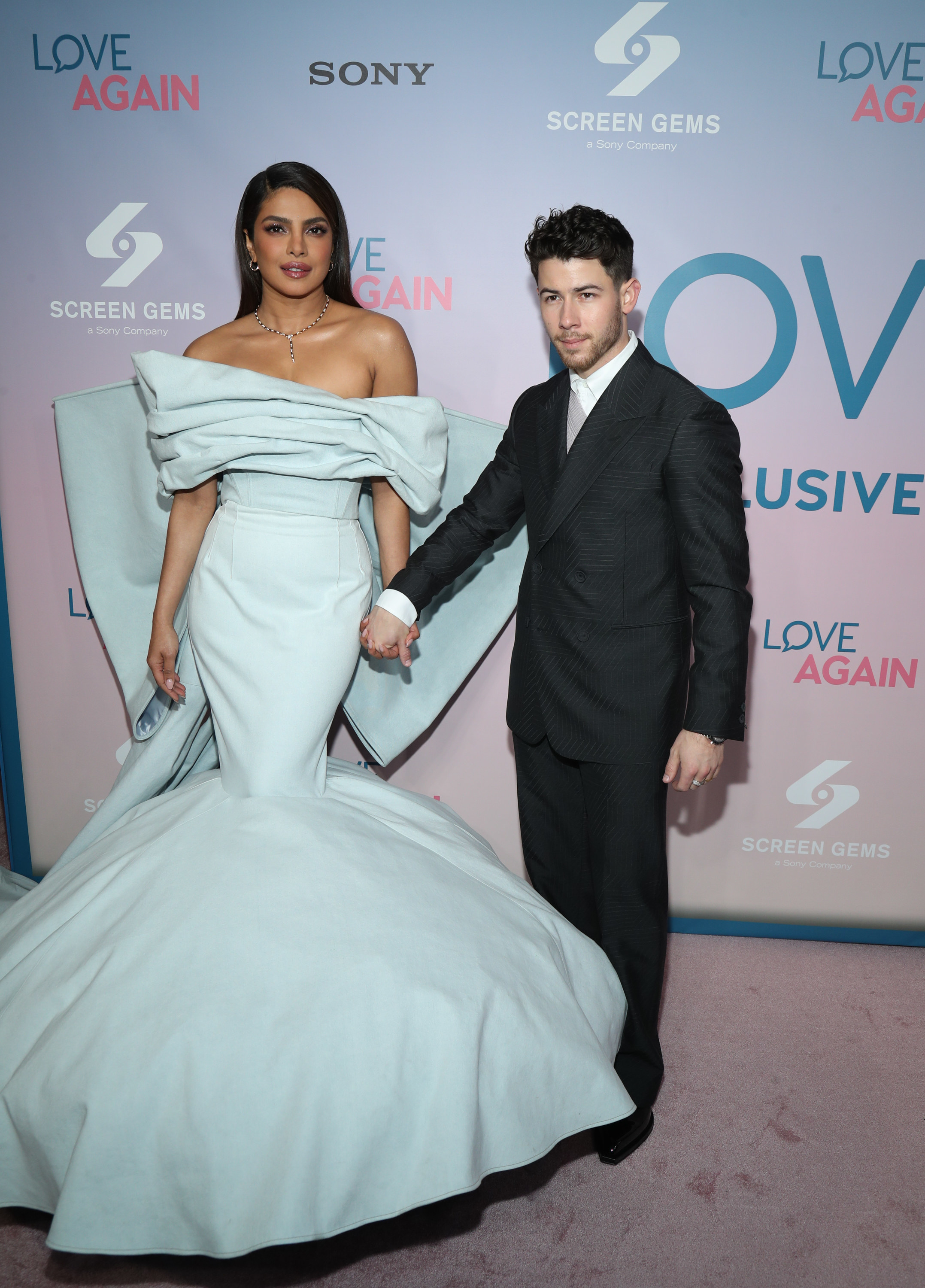 Priyanka and Nick holding hands on the red carpet