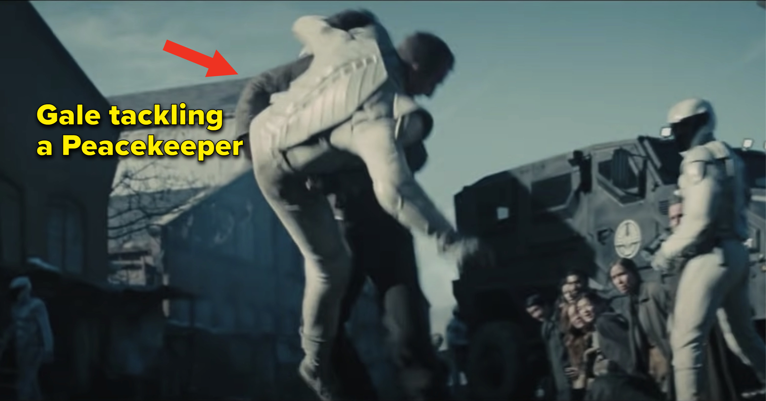 Gale from &quot;The Hunger Games: Catching Fire&quot; tackling a guard with the caption &quot;Gale tackling a Peacekeeper&quot;